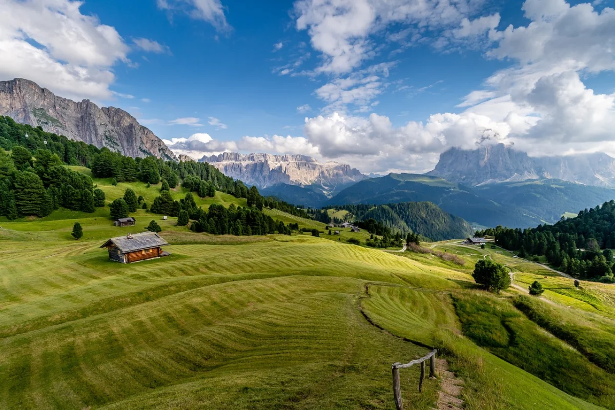 Alpine meadows and traditional farmhouses in Val Gardena