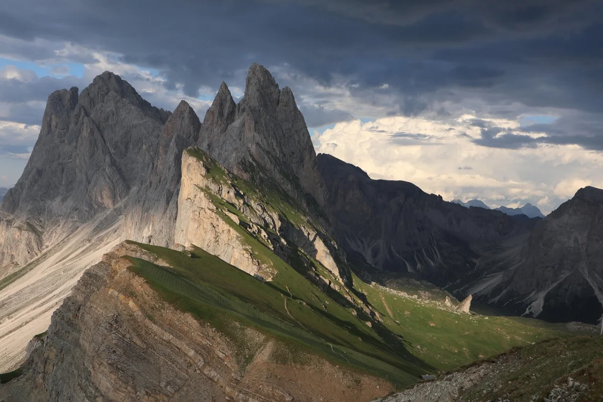 Jagged Seceda ridgeline rising above the green slopes of the Dolomites