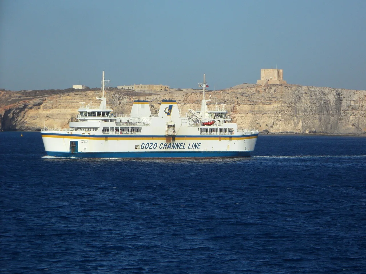 Small ferry travelling between Gozo and Comino