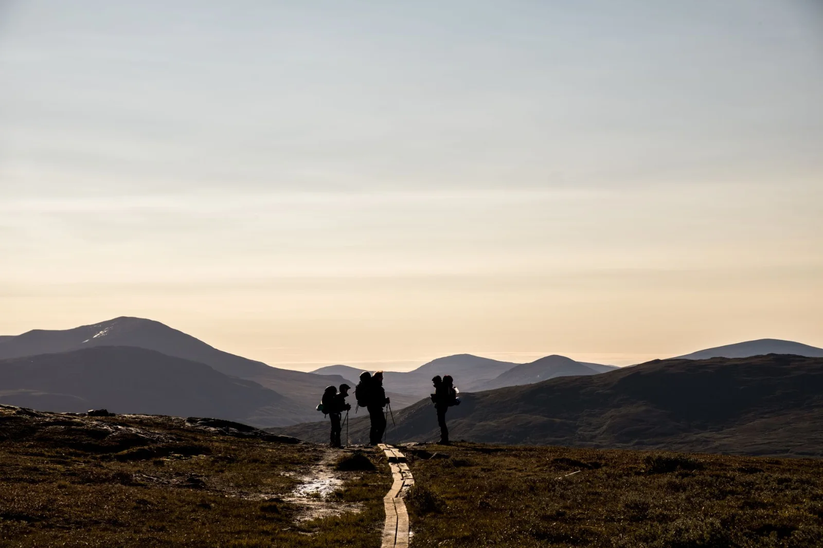 Hikers following a mountain path across the Jämtland fells