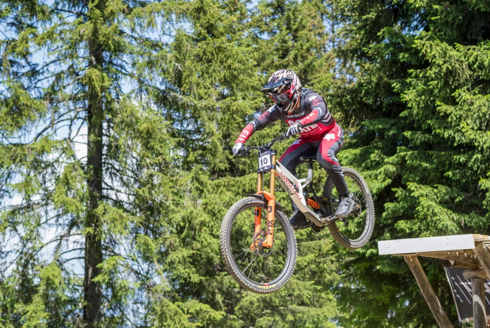 Mountain biker jumping during a race in Vaz/Obervaz, Switzerland