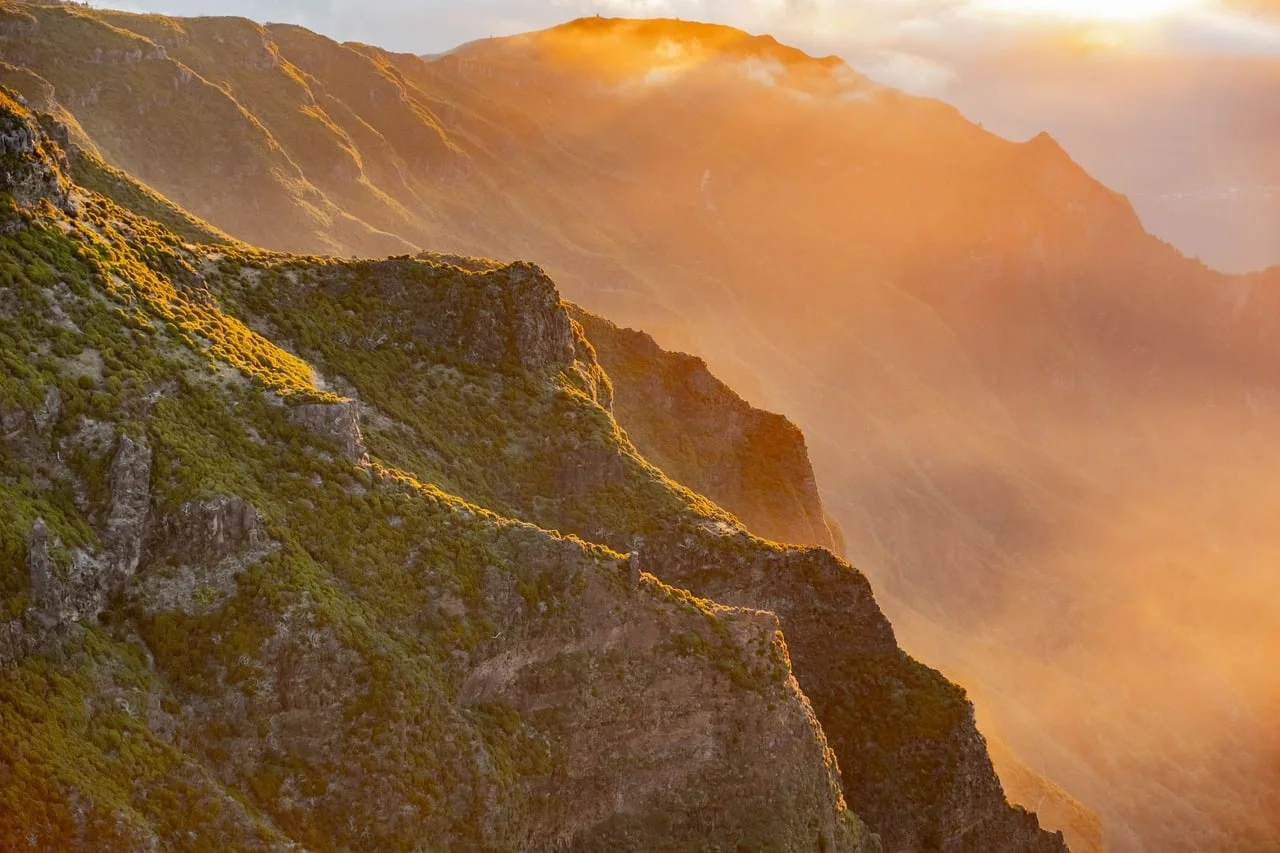 Mountain summit path with cliffs and panorama in Madeira