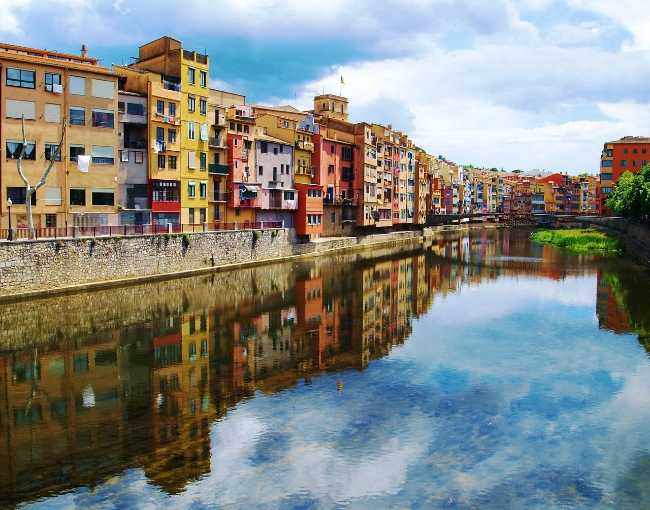 Colourful riverside buildings along the Onyar River in Girona, Spain