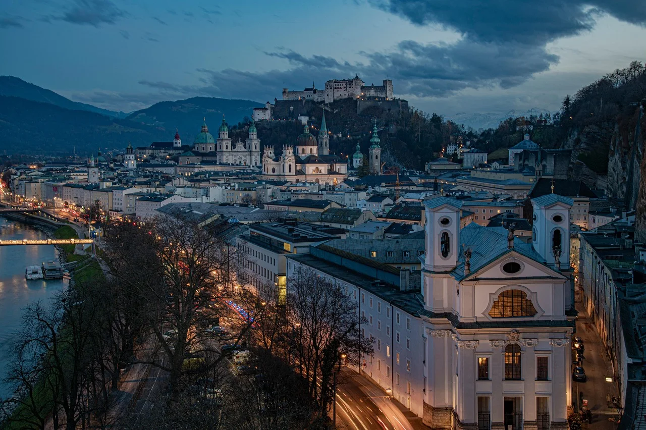 Salzburg rooftops seen from a wooded city mountain
