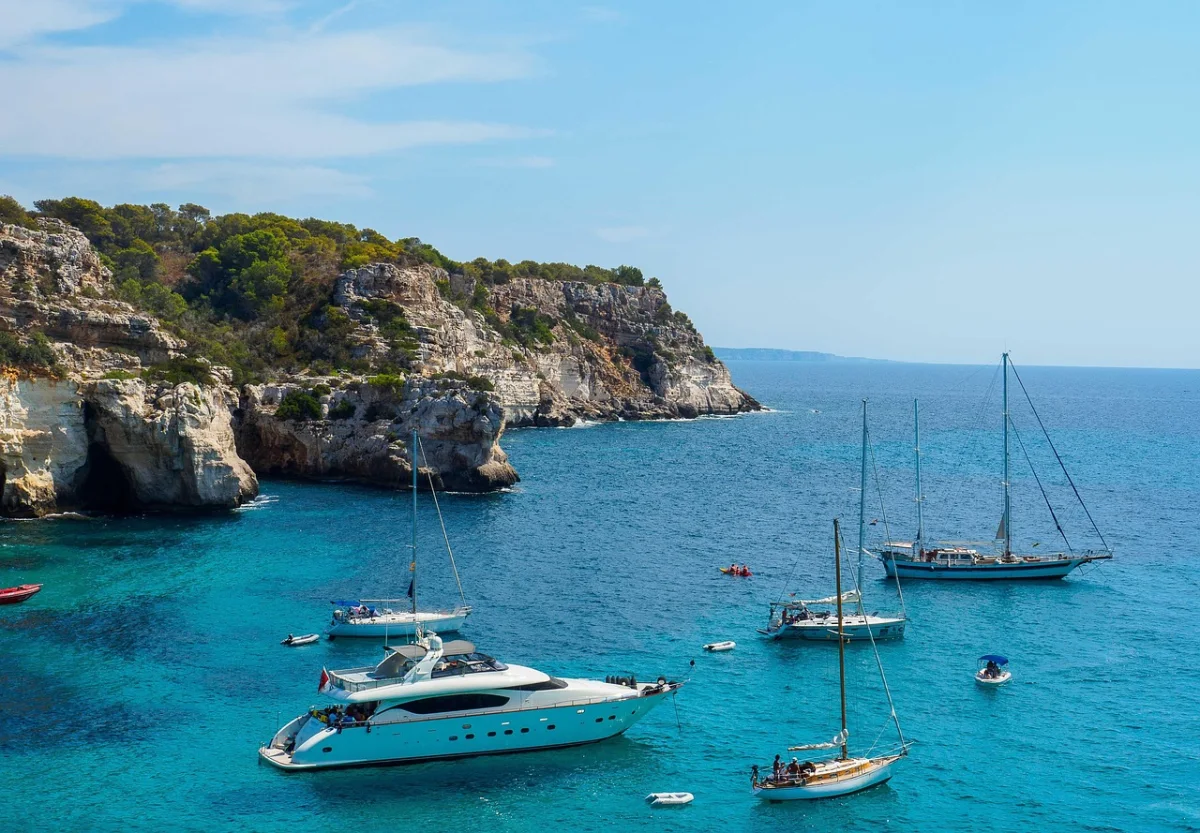 Turquoise waters of Cala Macarella along the Camí de Cavalls, Menorca