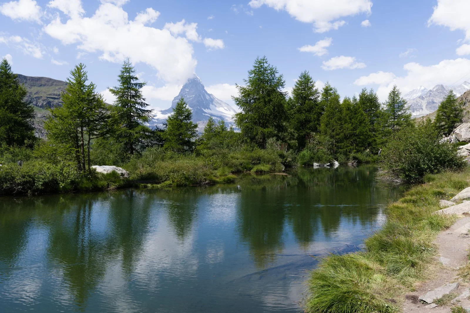 Matterhorn reflected in an alpine lake near Zermatt